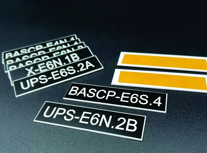 Engraved electrical panel labels in black and white and yellow