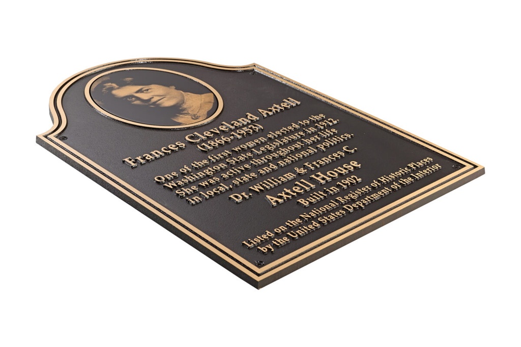 Bronze memorial plaque with relief portrait